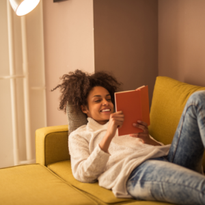 Woman Reading on Couch